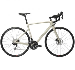 VÉLO ROUTE FEMME EDR CARBONE DISC SHIMANO 105 BEIGE